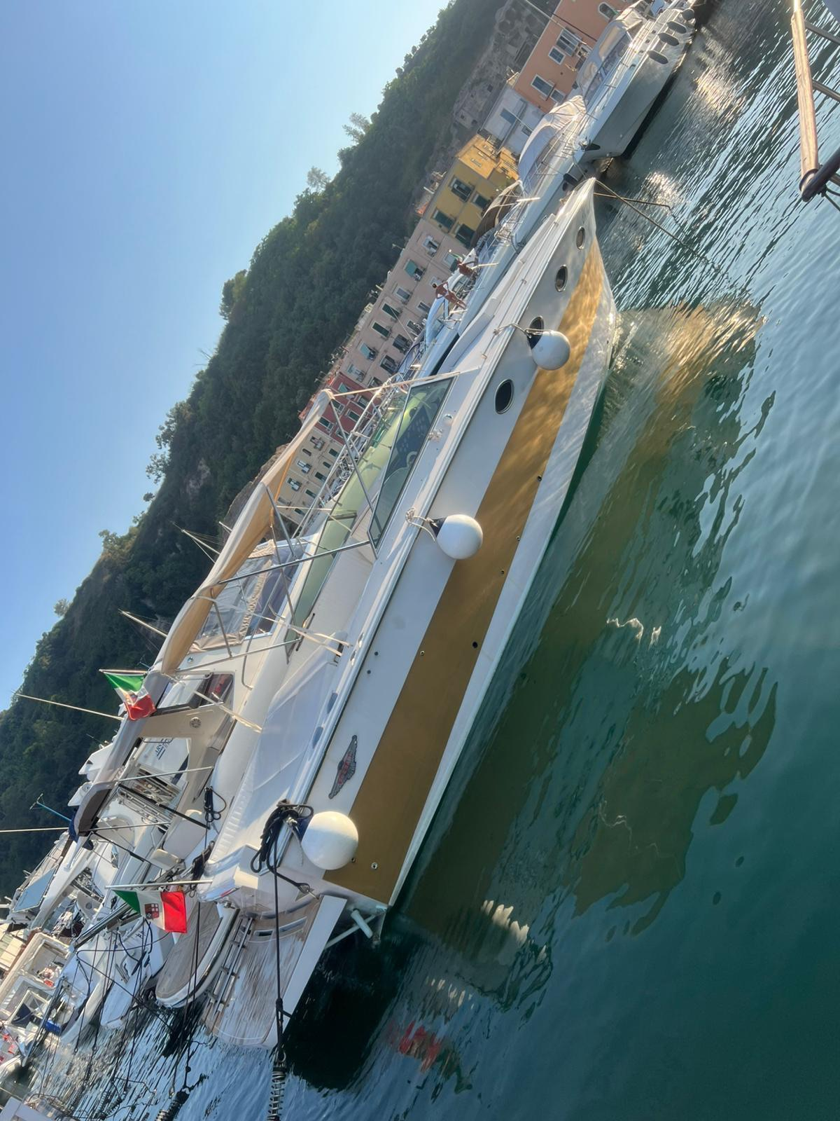 Tornado 38 moored in the marina